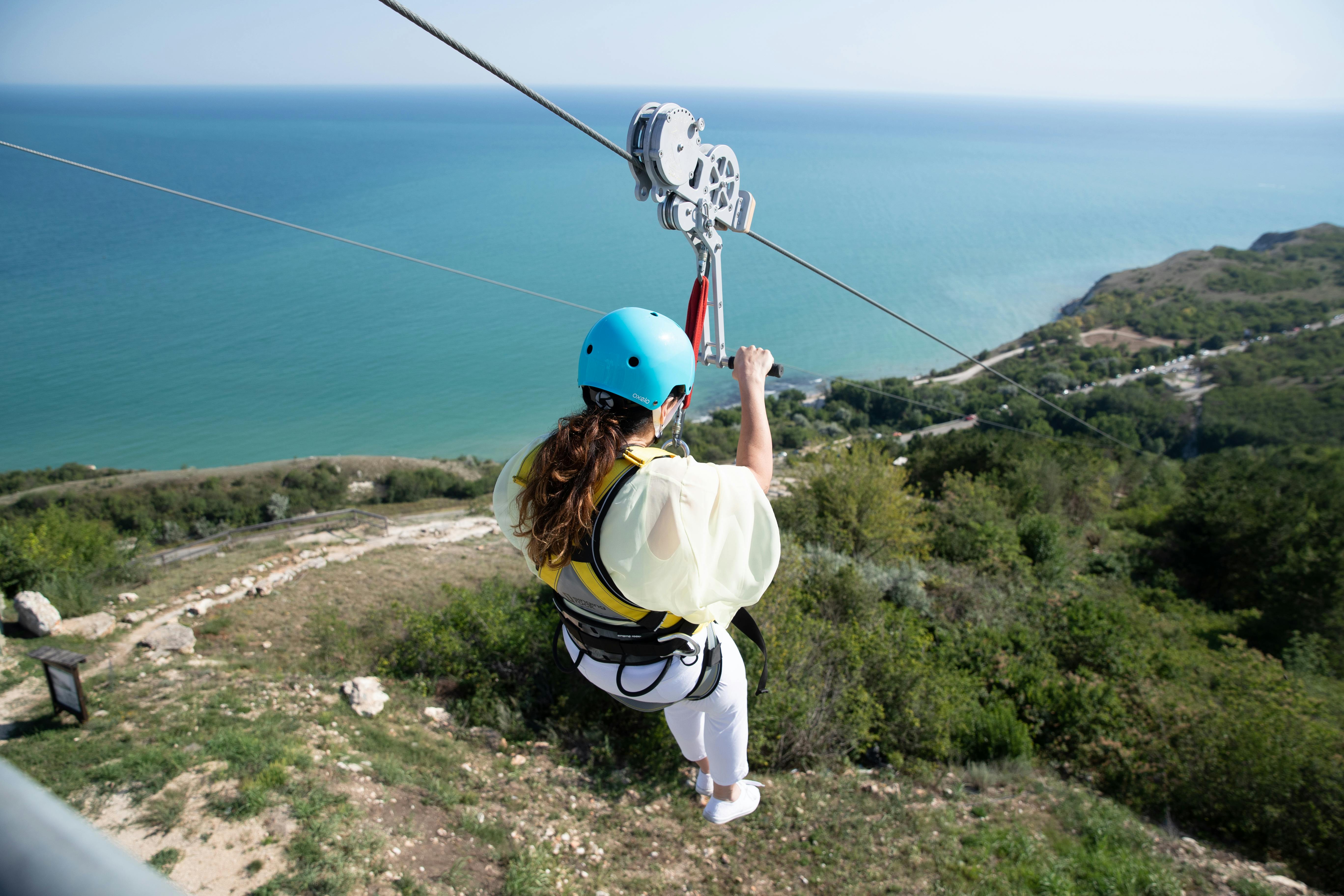 A Woman on Our Zipline Course Woman Ziplining